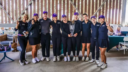 The TCU Women's Golf Team celebrates after winning the Jim West Challenge championship
