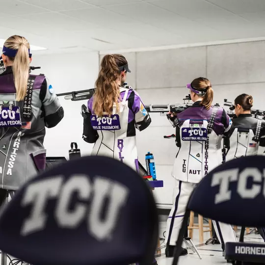 The team lines up on the line at the TCU Rifle Range.