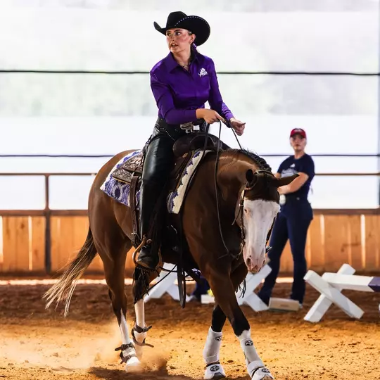 Rita Clausen Riding a Horse