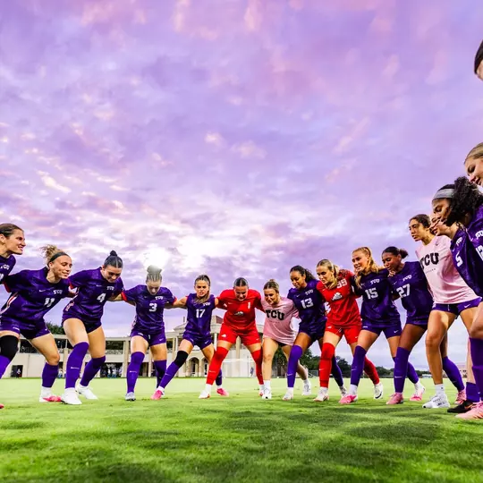 TCU women's soccer team huddle