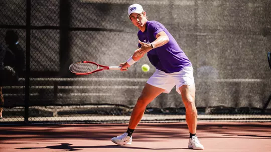 Oliver Bonding prepares to connect on a forehand