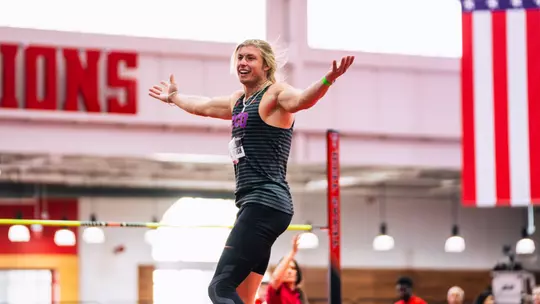 Yannik Knoblock celebrates after clearing the bar in high jump