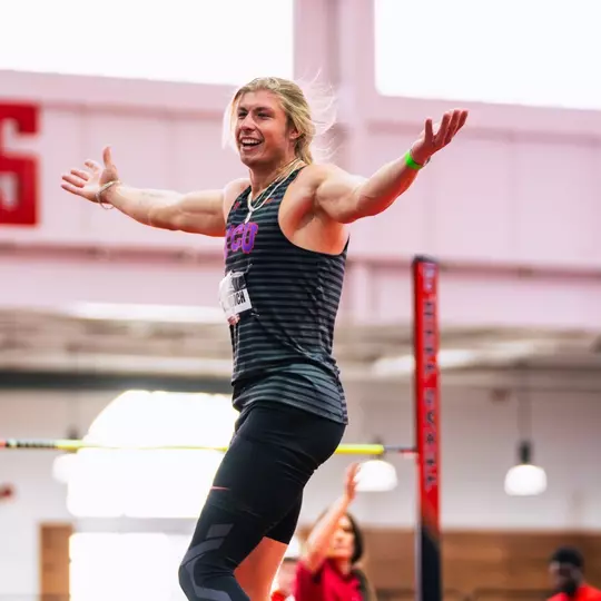 Yannik Knoblock celebrates after clearing the bar in high jump