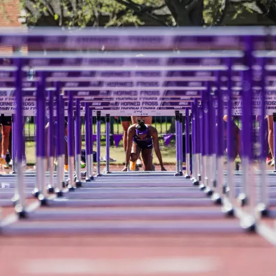 TCU's Amari Kiluvia getting ready to run the 100m hurdles