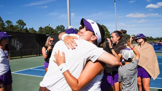 Victoria Gomez O'Hayon hugging Lee Taylor Walker