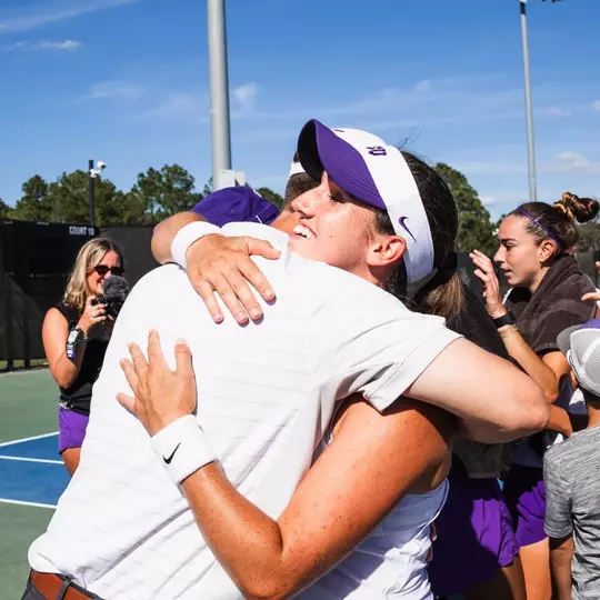 Victoria Gomez O'Hayon hugging Lee Taylor Walker
