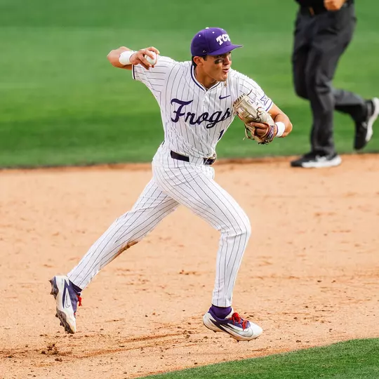 Jack Bell makes a running throw from shortstop against Arizona at Lupton Stadium.