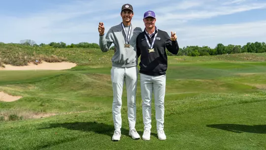Sam Udovich and Lewis Wright show off Big 12 All-Tournament.
