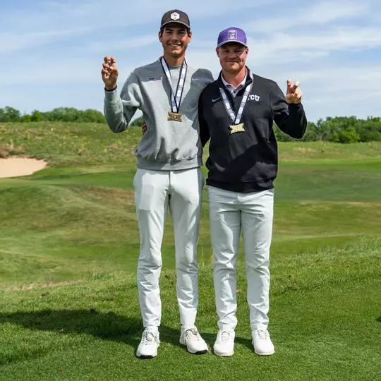 Sam Udovich and Lewis Wright show off Big 12 All-Tournament.