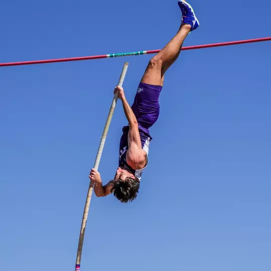 Michael McCloy jumping in the pole vault
