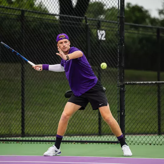 Cosme Rolland De Ravel hits a forehand.