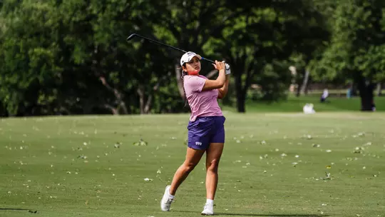 Kirstin Angosta tracks her ball after making contact with a 3-wood during the NCAA Waco Regional.