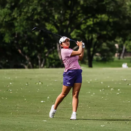 Kirstin Angosta tracks her ball after making contact with a 3-wood during the NCAA Waco Regional.