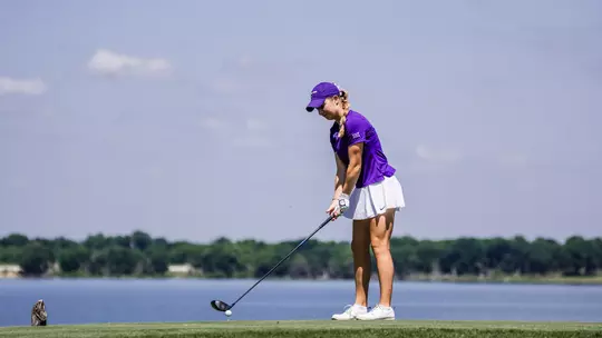 Sofie Dimitrova lines up her tee shot at Ridgewood Country Club.