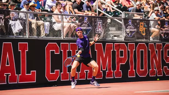 Cosme Rolland De Ravel hits a forehand in TCU's NCAA semifinal match vs. No. 1 Texas