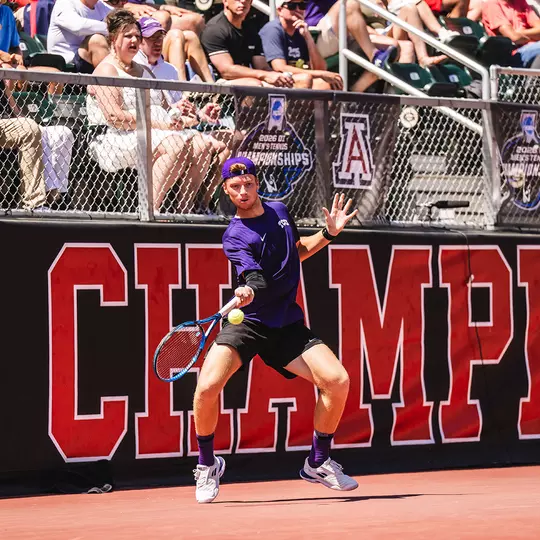 Cosme Rolland De Ravel hits a forehand in TCU's NCAA semifinal match vs. No. 1 Texas