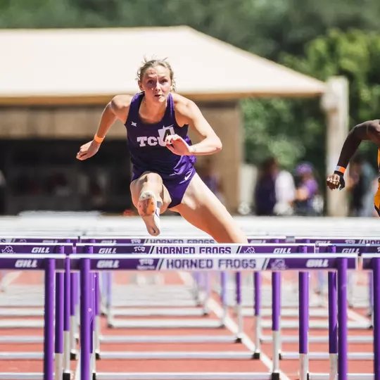 TCU track and field's Elise Dobson racing the 100m hurdles at the Horned Frog Invitational