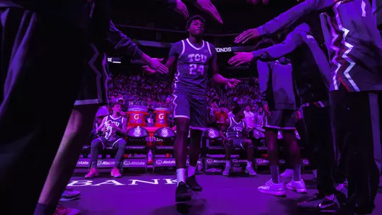xavier edmonds walks through during starting lineups