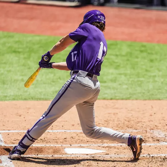 Rob Liddington hits a home run against Oklahoma State.