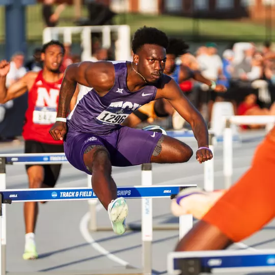 TCU's Jayden Douglas jumps over a hurdle at the NCAA West First Round