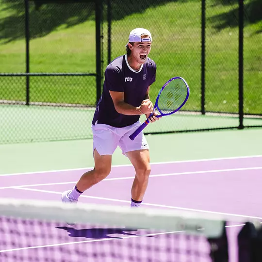 Albert Pedrico celebrates during the doubles point of a match vs. Stanford.