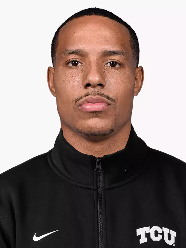 head shot of desmond bane in black shirt with white tcu logo