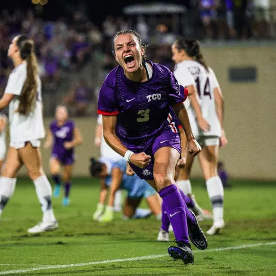 AJ Hennessey celebrating after scoring a game-winning goal against Texas A&M