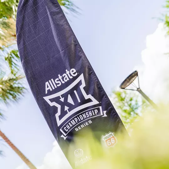 Big 12 Tournament signage displayed at the USTA National campus ahead of the men's and women's tennis conference championships