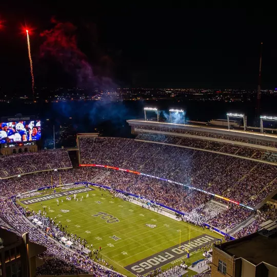 Ariel shot of Amon G. Carter Stadium with fireworks going off