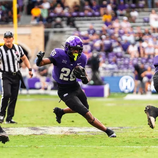 Jeremy Payne running with the ball at home against Baylor