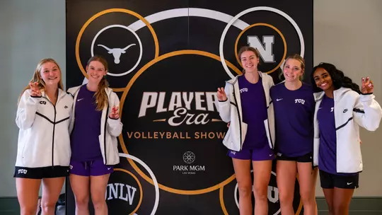 Josie Valgus, Molly McCarthy, Lauren Murphy, Morgan Holloman and Evan Hendrix stand in front of a Players Era sign