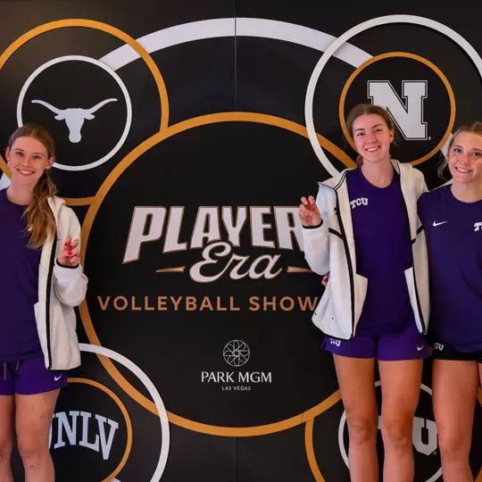 Josie Valgus, Molly McCarthy, Lauren Murphy, Morgan Holloman and Evan Hendrix stand in front of a Players Era sign
