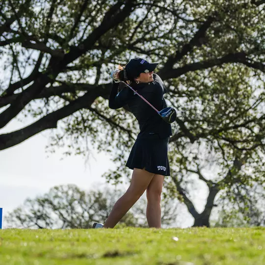 Gracie McGovern follows through on a tee shot.
