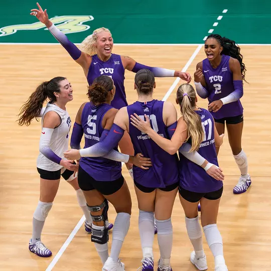 TCU Volleyball celebrates in a huddle