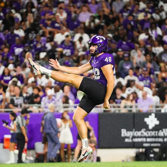 John Hoyet Chance punting the ball against Grambling State