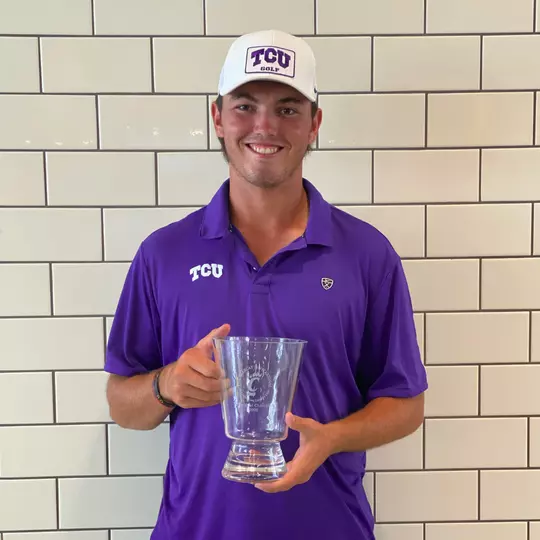 Cameron Kuchar with the trophy after winning the Bearcat Invitational