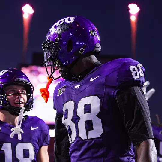 Ka'Morreun Pimpton and Ed Small celebrating a touchdown with fireworks going off