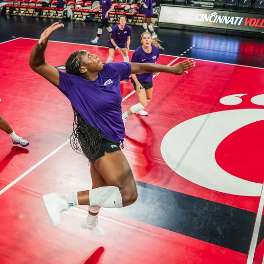 Dee McMillian hits a slide at TCU volleyball's practice in Cincinnati