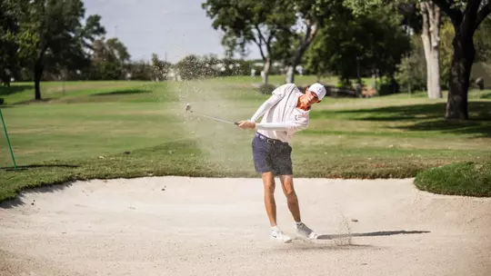 Nathan Miller hits out of the bunker.
