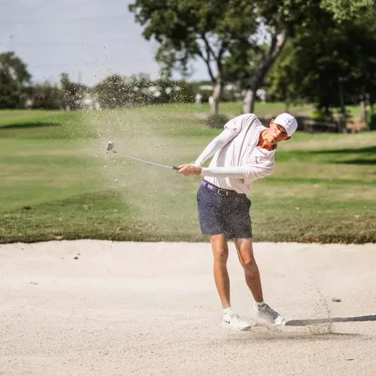 Nathan Miller hits out of the bunker.