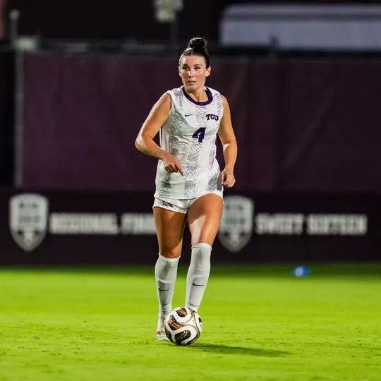 Zoe Cuneio dribbling the ball against Texas A&M