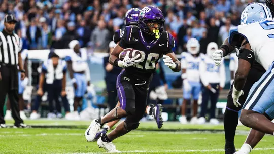 Jeremy Payne running with the football against North Carolina