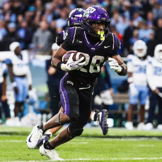 Jeremy Payne running with the football against North Carolina