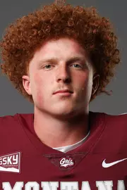 A football recruit poses in the studio on July 18, 2025, in the Adams Center.