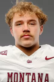 A recruit poses in the Adams Center on December 14, 2025, in Missoula, Montana.