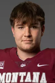 A football recruit takes photos.