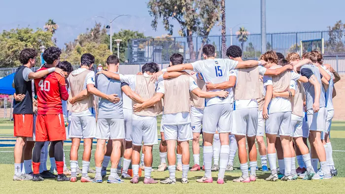 Mens Soccer Team Huddle