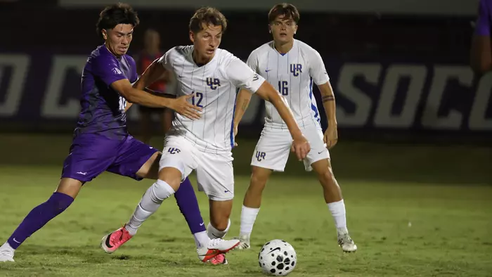 Brady Elliott holds off defenders at GCU