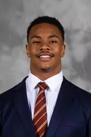 gophers defensive back Chris Williamson (6)