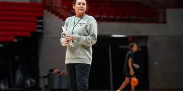 Coach Palmer watches the first practice of the season